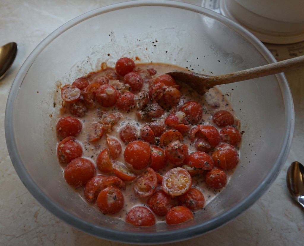 Tomatoes and other ingredients ready to cook